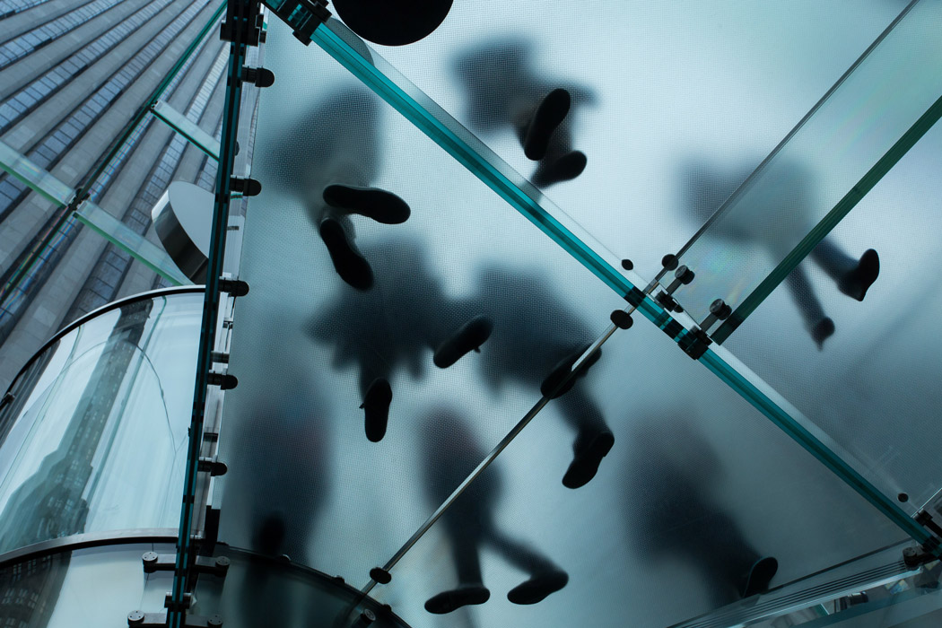 Footprints on glass platform at Fifth Avenue Apple Store