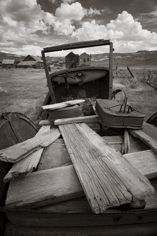 View of Bodie, California through old work truck's windshield