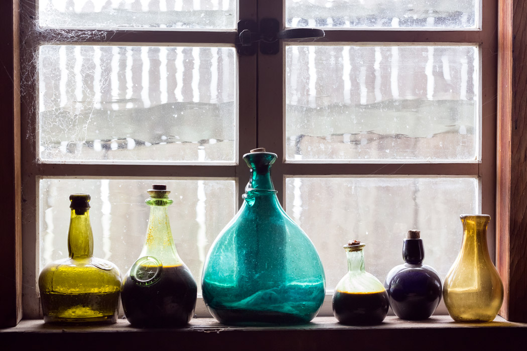Old bottles in Fort Ross window