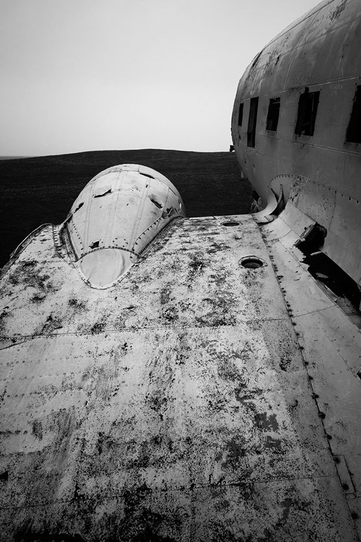 Standing on the wing of the Iceland plane wreck
